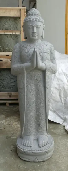 Product image of the product “Standing Buddha with floral carving, Greeting position. 40 x 28 x 122m. Natural stone (river stone), stonemasonry ”